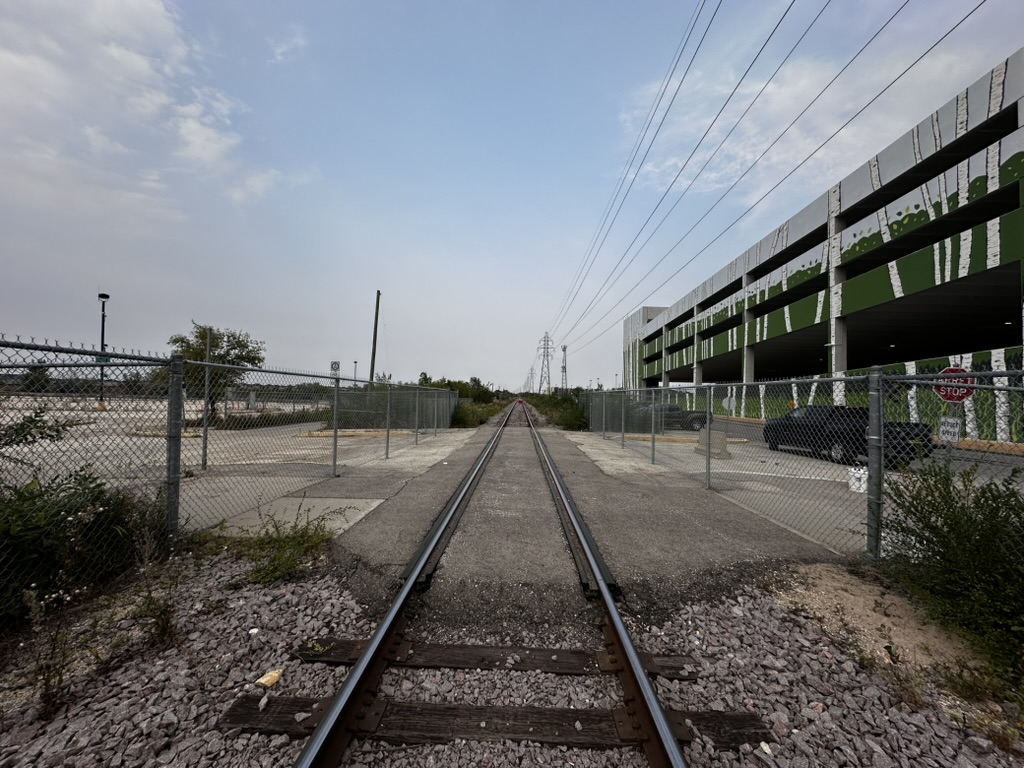 Commercial chain link fencing along railroad