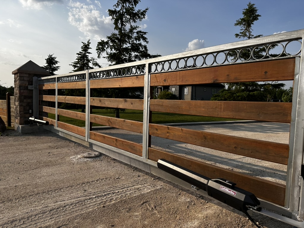 Custom wood gate with scrollwork and specialty fabrication
